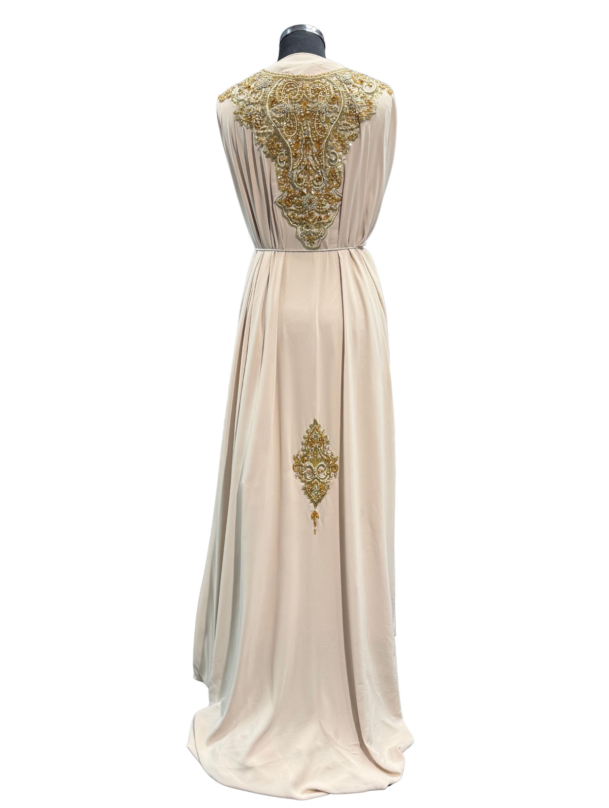 Beige crêpe caftan stof met gouden borduursel.