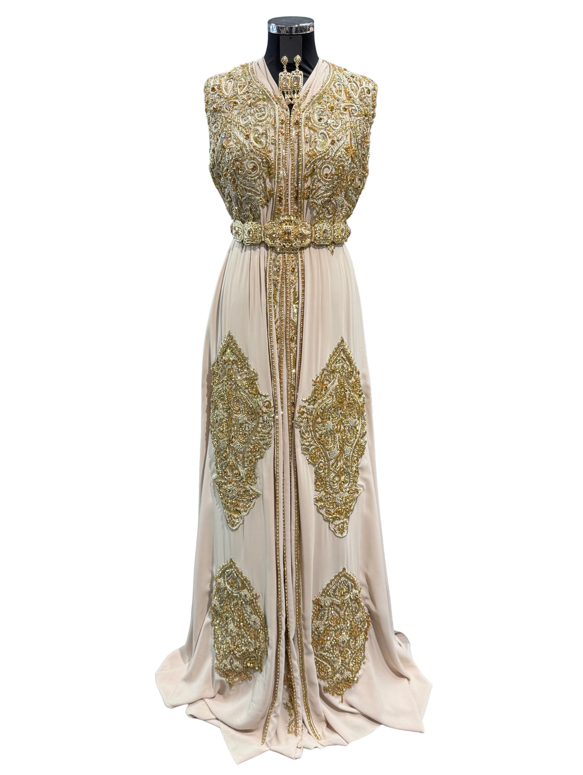 Beige crêpe caftan stof met gouden borduursel.