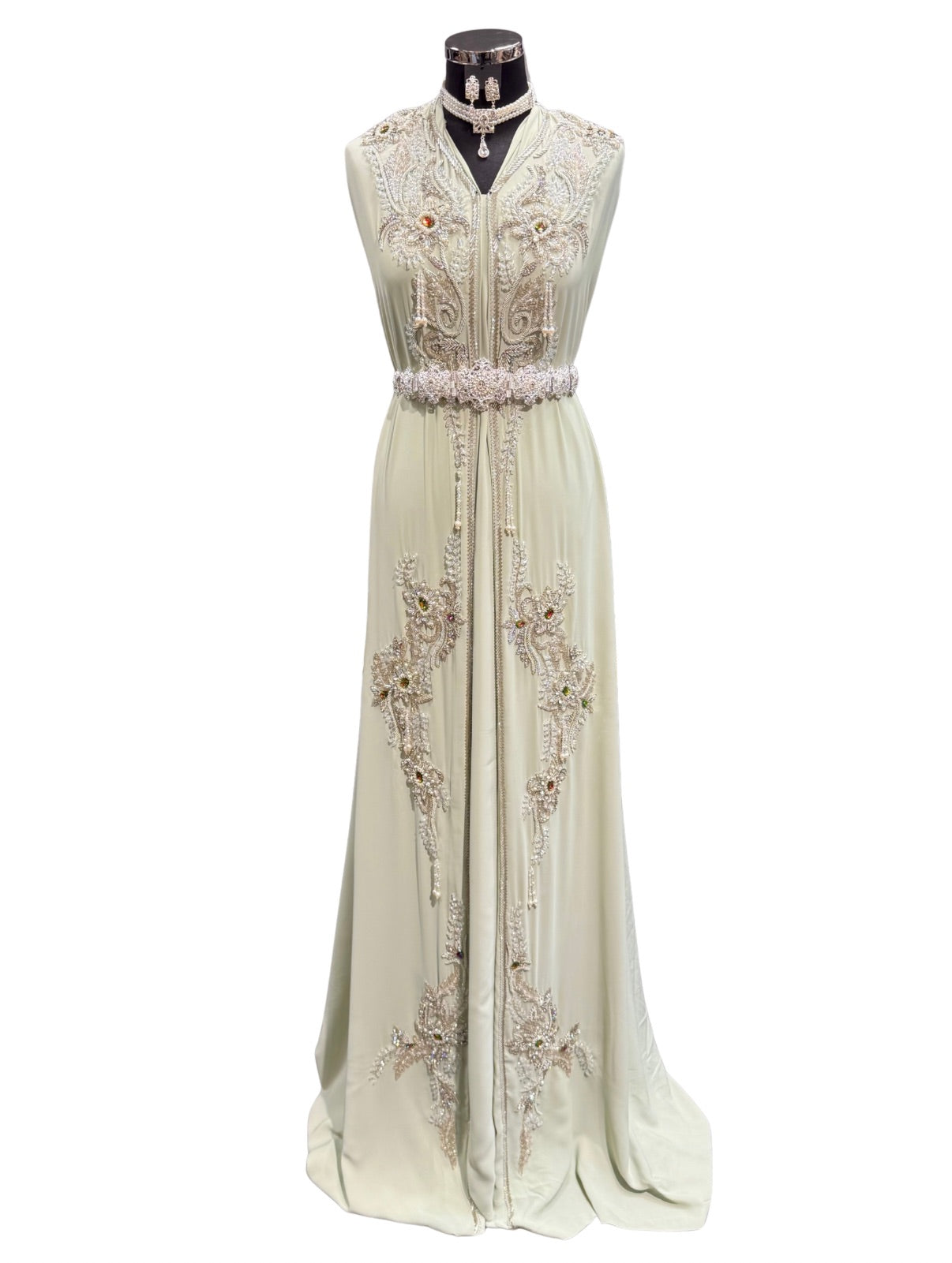 Caftan of takshita stof mintgroen met zilveren bewerking.