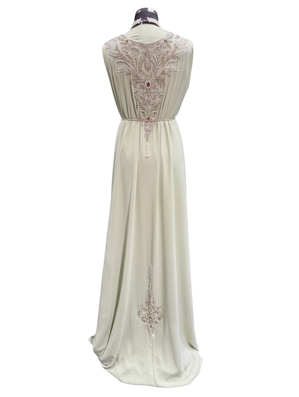 Caftan of takshita stof mintgroen met zilveren bewerking.