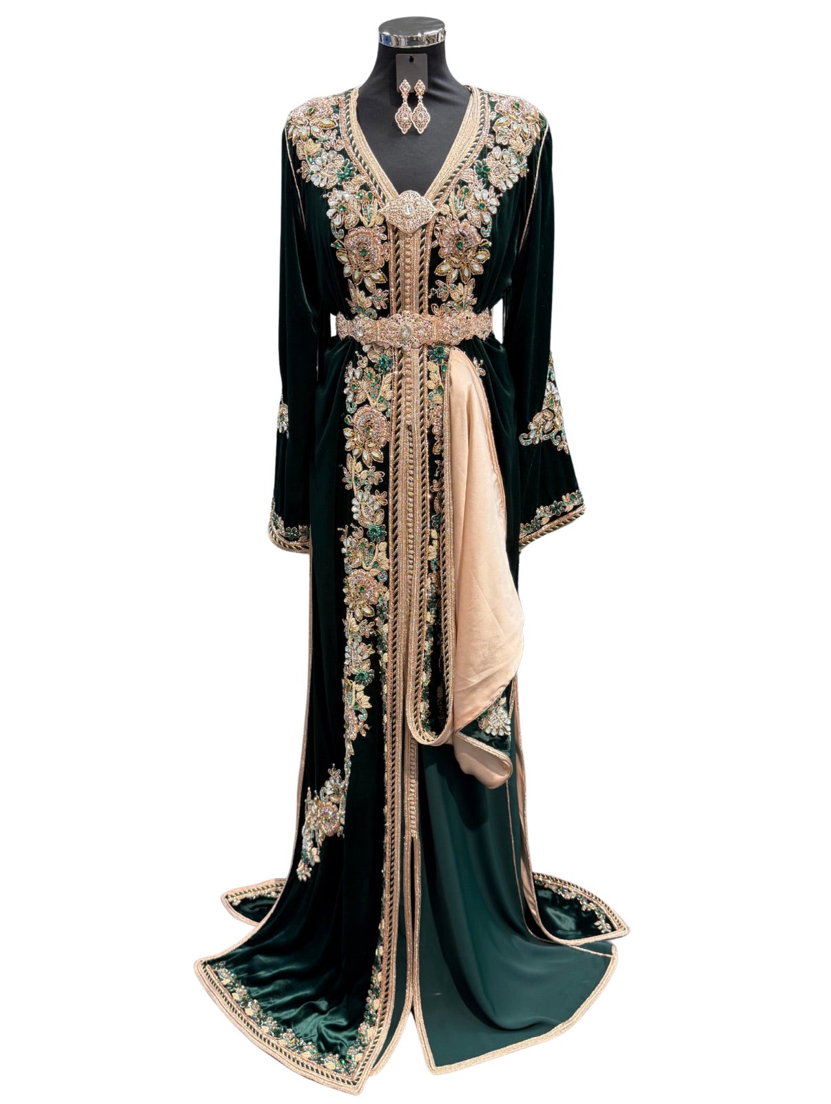 Donkergroene takshita gemaakt van luxe fluweel, afgewerkt met verfijnde details en een elegante traditionele pasvorm.