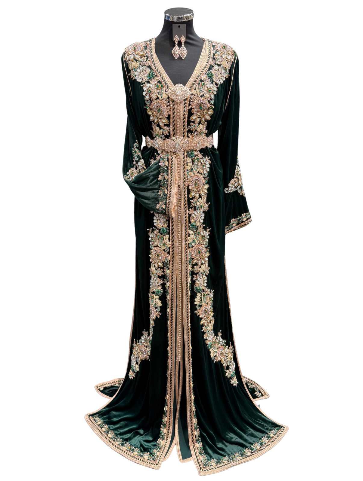 Donkergroene takshita gemaakt van luxe fluweel, afgewerkt met verfijnde details en een elegante traditionele pasvorm.